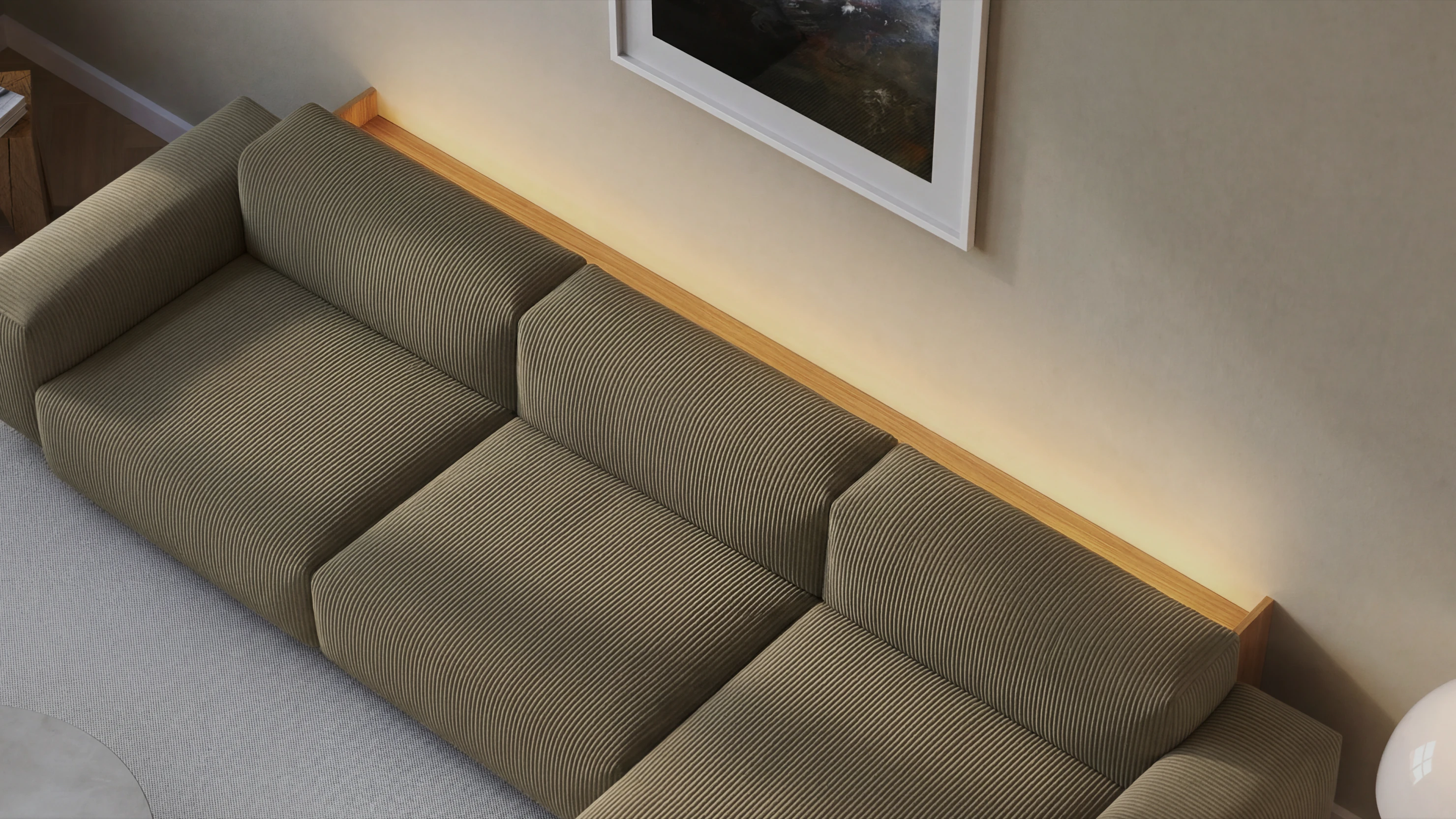 OLVA passgenau auf die Breite des Sofas gefertigt – maßgefertigtes Eichenmöbel hinter dem Sofa